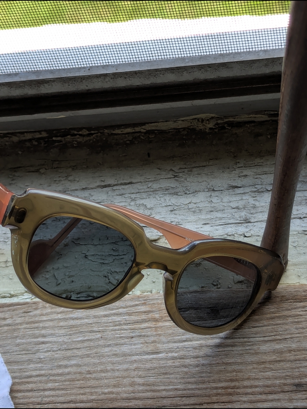 Anne Et Valentin Sunglasses with Brown/Olive Front And Peach temples.